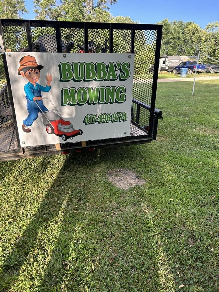 Bubba’s Mowing trailer with the company logo and phone number